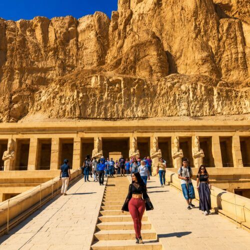 6-day Cairo Luxor and Aswan private Egypt tour package Travelers exploring the Great Pyramids of Giza in Cairo Karnak Temple in Luxor during a private Egypt tour Valley of the Kings royal tombs in Luxor, Egypt Temple of Hatshepsut on the west bank of Luxor Luxor Temple illuminated at sunset in Egypt Philae Temple on Agilkia Island in Aswan Traditional boat sailing near Philae Temple in Aswan Aswan High Dam overlooking Lake Nasser Private Egypt holiday featuring Cairo, Luxor, and Aswan Egyptologist guide leading a tour through ancient Egyptian temples Grand Egyptian Museum visit during a Cairo sightseeing tour Ancient hieroglyphs inside a temple in Luxor Six-day Egypt vacation exploring Cairo, Luxor, and Aswan Private cultural tour through Egypt's most famous archaeological sites