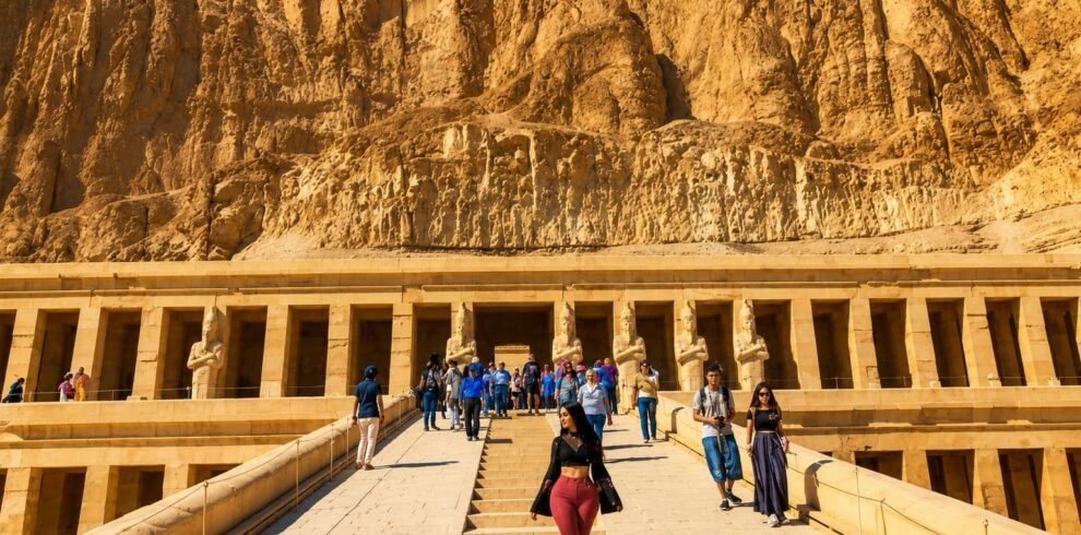 6-day Cairo Luxor and Aswan private Egypt tour package Travelers exploring the Great Pyramids of Giza in Cairo Karnak Temple in Luxor during a private Egypt tour Valley of the Kings royal tombs in Luxor, Egypt Temple of Hatshepsut on the west bank of Luxor Luxor Temple illuminated at sunset in Egypt Philae Temple on Agilkia Island in Aswan Traditional boat sailing near Philae Temple in Aswan Aswan High Dam overlooking Lake Nasser Private Egypt holiday featuring Cairo, Luxor, and Aswan Egyptologist guide leading a tour through ancient Egyptian temples Grand Egyptian Museum visit during a Cairo sightseeing tour Ancient hieroglyphs inside a temple in Luxor Six-day Egypt vacation exploring Cairo, Luxor, and Aswan Private cultural tour through Egypt's most famous archaeological sites