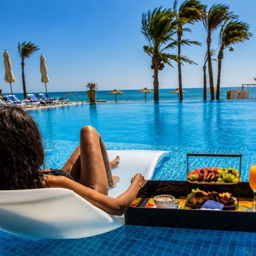 Here are SEO-friendly **Alt Text** options for your **Ain Sokhna Day Trip from Cairo** page: 1. Ain Sokhna day trip from Cairo with Red Sea beach and resort 2. Travelers relaxing on the sandy beach in Ain Sokhna near Cairo 3. Crystal-clear Red Sea waters at Ain Sokhna beach resort 4. Private Ain Sokhna beach day tour from Cairo 5. Swimming in the Red Sea during an Ain Sokhna day trip 6. Beautiful Ain Sokhna beach with turquoise waters and golden sand 7. Couple enjoying a relaxing beach holiday in Ain Sokhna 8. Family enjoying a Red Sea beach day in Ain Sokhna from Cairo 9. Beach resort in Ain Sokhna with panoramic Red Sea views 10. Private Red Sea escape from Cairo to Ain Sokhna 11. Relaxing by the pool at an Ain Sokhna beach resort 12. Sunbathing on the beautiful beaches of Ain Sokhna, Egypt 13. Red Sea coastline during an Ain Sokhna day excursion 14. Scenic beach getaway from Cairo to Ain Sokhna 15. Ain Sokhna beach resort offering a relaxing Red Sea day trip These alt texts are optimized with valuable keywords such as **Ain Sokhna**, **Cairo**, **Red Sea**, **beach resort**, **day trip**, and **private tour**, while remaining descriptive and accessible.